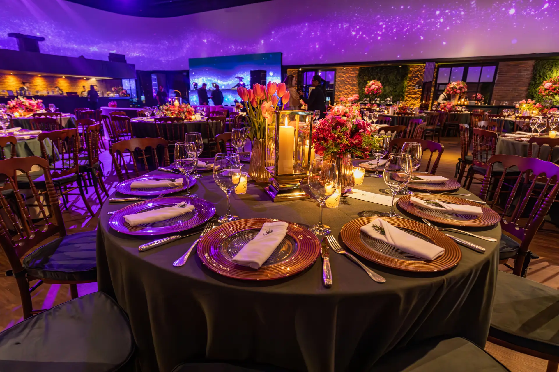 Wedding reception under glowing ceiling